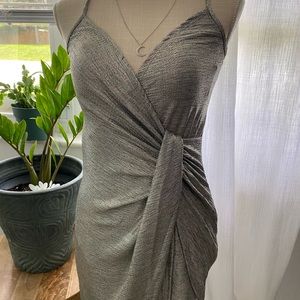 Sexy, sassy, slinky, silver knot front dress. Confidence goes a long way.